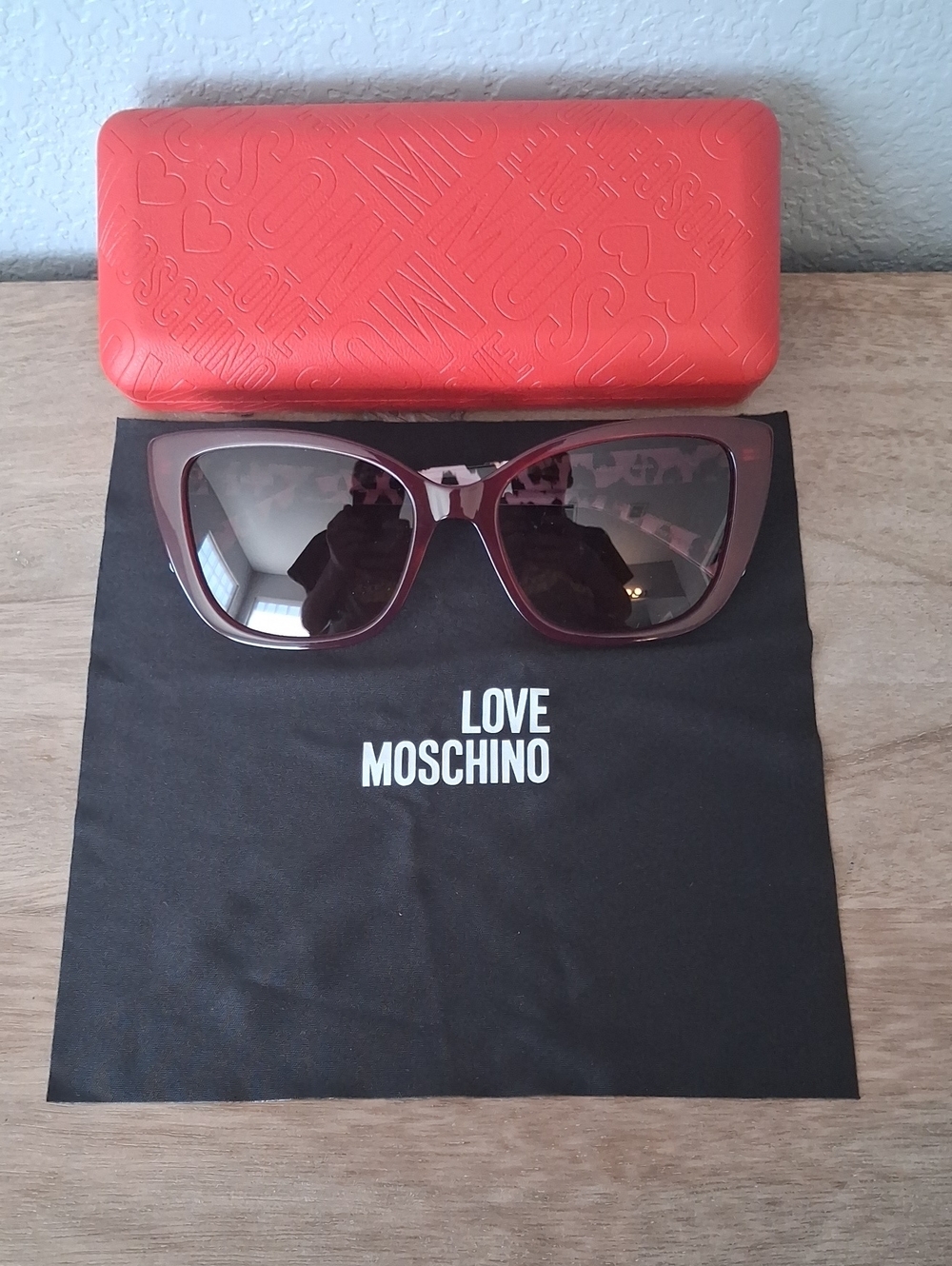 Love Moschino Burgundy Cat-Eye Sunglasses with Red Case
